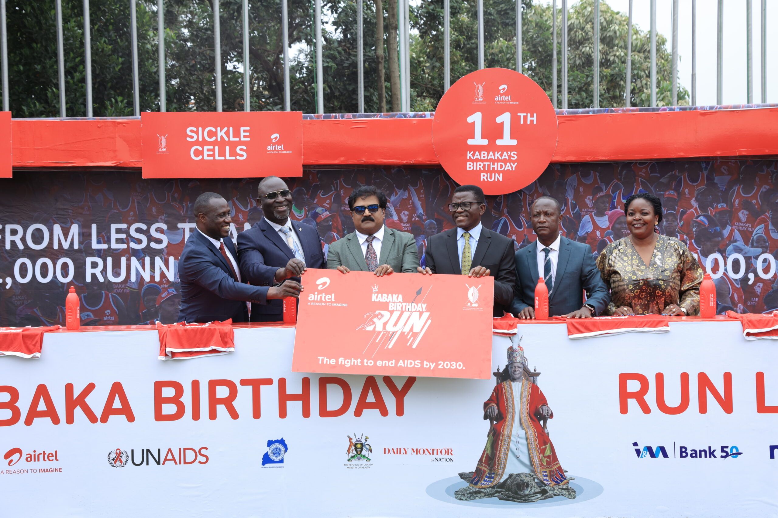 Owek. Charles Peter Mayiga (Centre), the Katikkiro of Buganda, Airtel Uganda Managing Director, Manoj Murali (3rd L), 2nd Deputy. Katikkiro Owek. Robert Waggwa Nsibirwa (2nd L) and other officials from Airtel Uganda and Buganda Kingdom during a photo moment at the launch of the 11th Edition of the Kabaka Birthday Run which is slated for 7th April 2024.